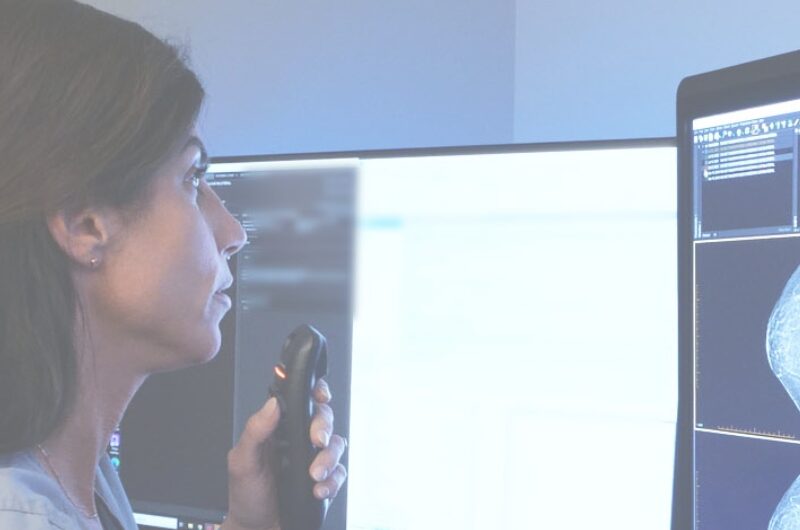 Dr. B examining a mammography image