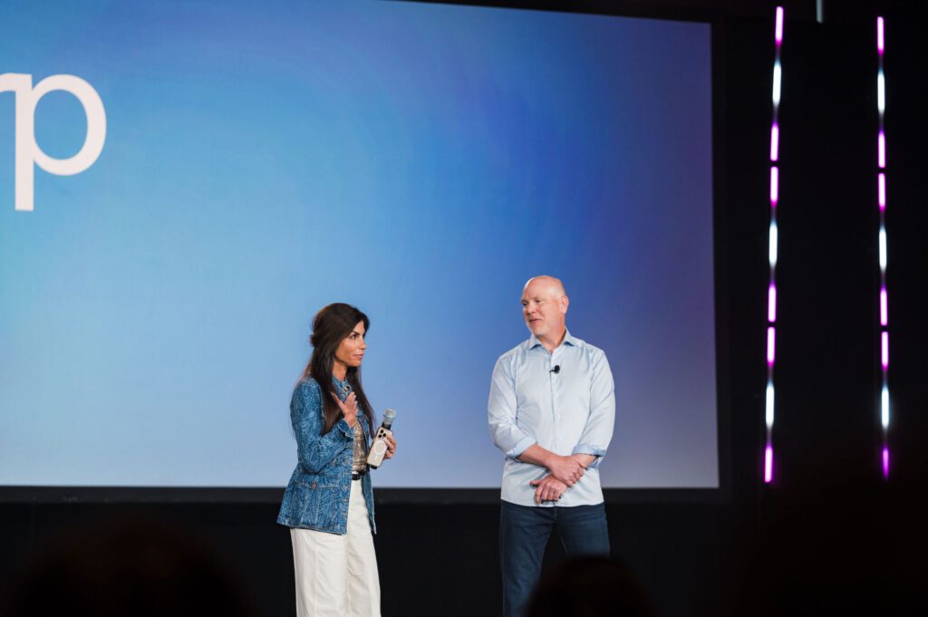 Dr. B speaking onstage at PLS with RP CEO Rich Whitney