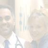 A doctor with a stethoscope around his neck stands next to a smiling woman in an RP clinic hallway, both looking at the camera. The image is faded and softly lit.